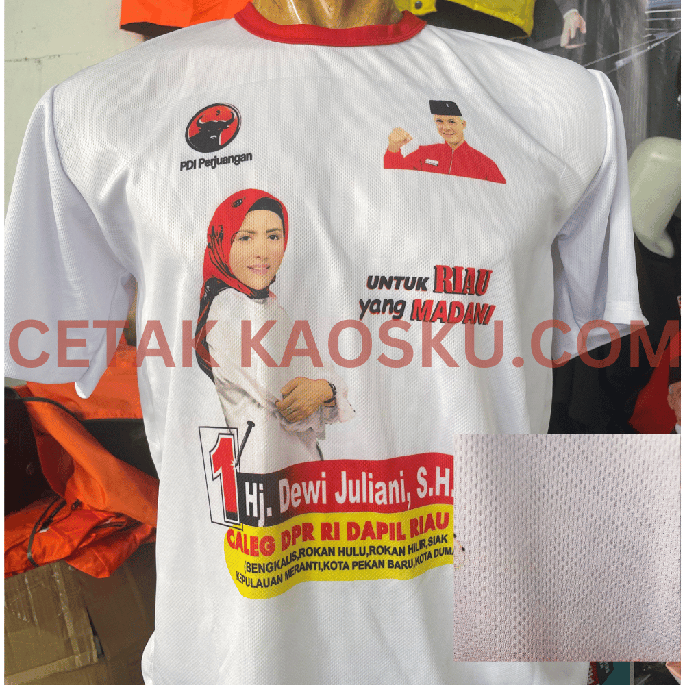 Contoh kaos partai PDI Perjuangan bahan dry-fit Billabong dengan sablon sublimasi A4, desain caleg Dewi Juliani untuk Dapil Riau, diproduksi oleh Cetakkaosku.com